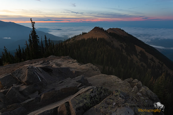 Late summer dusk setting on Puget Sound from Olympic Mountains