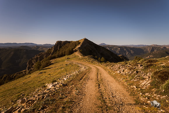 Road along mountain ridge leading to Puntal de la Misa